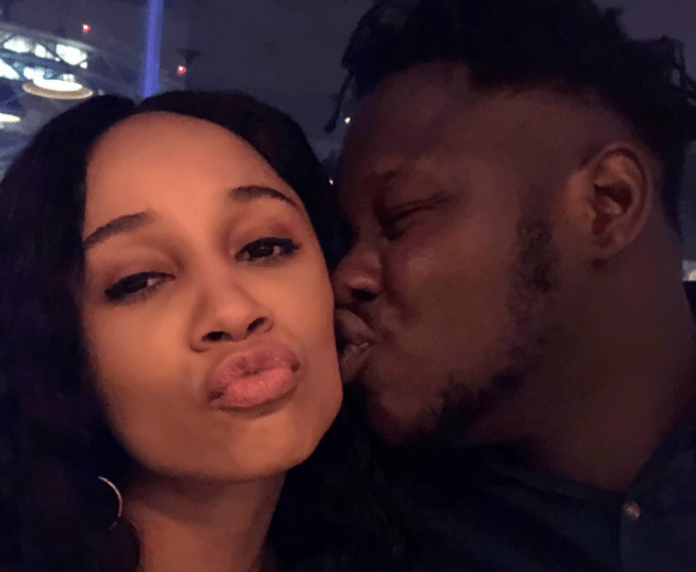 Medikal gives Sister Derby a peck on the cheeks