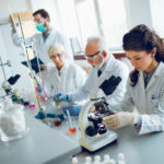 Laboratory scientists working in a lab