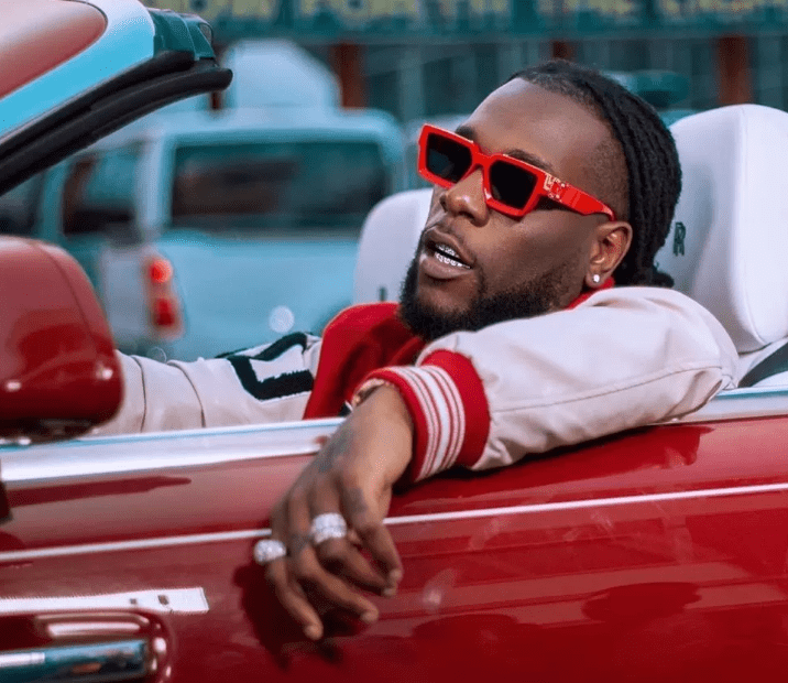 Burna Boy in his Rolls Royce car