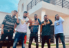 Shatta Wale and his Shatta Movement militants pose in front of his mansion at East Legon