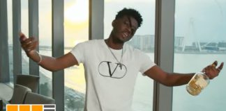 Rapper Kwesi Slay in "Billionaire" music video