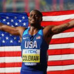 Christian Coleman celebrates his gold medal at the Doha World Championships in 2019