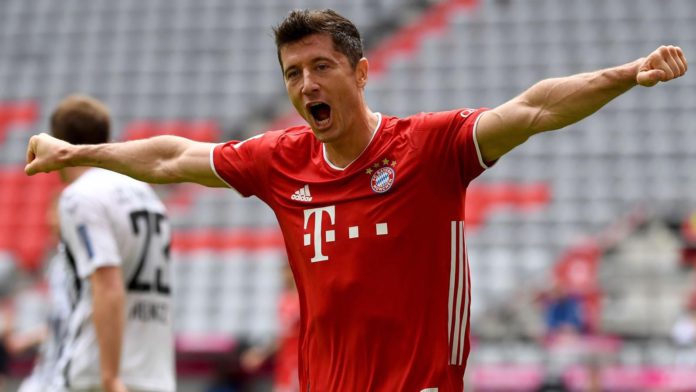 Robert Lewandowski celebrates after scoring his team's second goal during the German first division Bundesliga football match FC Bayern Munich v SC Freiburg on June 20, 2020 Image credit: Getty Images