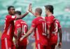 Robert Lewandowski of Bayern Muenchen celebrates the third goal for his team with Michael Cuisance of Bayern Muenchen and David Alaba of Bayern Muenchen during the Bundesliga match between VfL Wolfsburg and FC Bayern Muenchen at Volkswagen Arena on June 2 Image credit: Getty Images