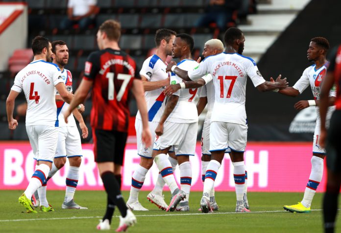 Jordan Ayew celebrates with his Palace teammates