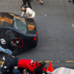 Man drives car toward Seattle protesters then shoots one, police say