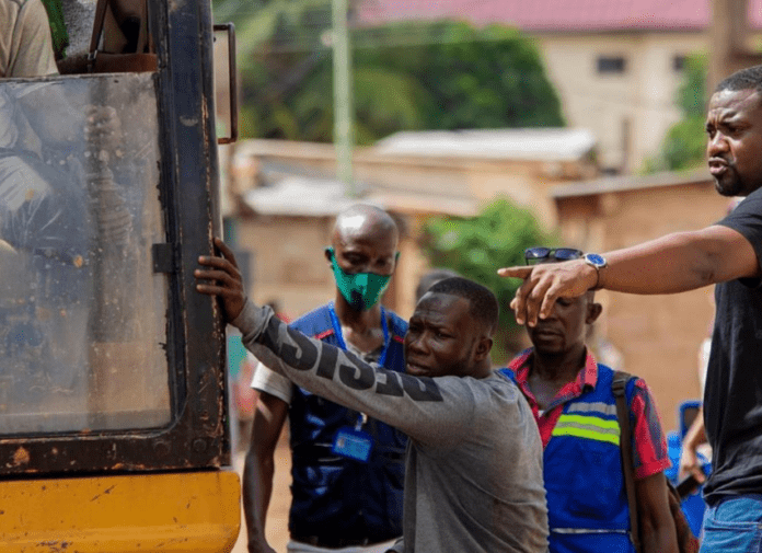 John Dumelo dredges big gutter that causes flood at West Legon