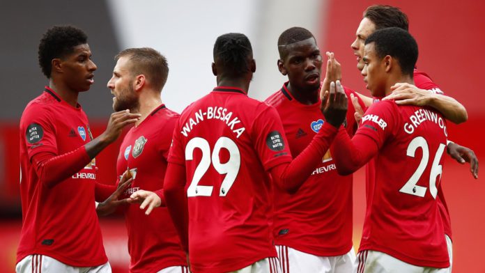 Mason Greenwood of Manchester United celebrates with teammates after scoring his team's first goal during the Premier League match between Manchester United and AFC Bournemouth at Old Trafford Image credit: Getty Images