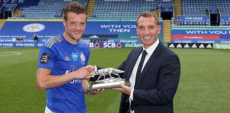 Jamie Vardy of Leicester City is presented with a silver fox by Leicester City Manager Brendan Rodgers, to commemorate scoring 100 Premier League goals Image credit: Getty Images