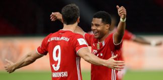Robert Lewandowski of FC Bayern Muenchen celebrates with teammate Serge Gnabry of FC Bayern Muenchen after scoring his team's third goal during the DFB Cup final match between Bayer 04 Leverkusen and FC Bayern Muenchen at Olympiastadion on July 04 Image credit: Getty Images
