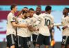 Bruno Fernandes of Manchester United celebrates with team mates after scoring the opening goal from a penalty kick during the Premier League match between Aston Villa and Manchester United at Villa Park Image credit: Getty Images