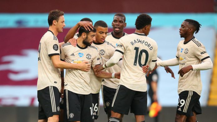 Bruno Fernandes of Manchester United celebrates with team mates after scoring the opening goal from a penalty kick during the Premier League match between Aston Villa and Manchester United at Villa Park Image credit: Getty Images