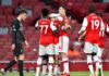 Reiss Nelson of Arsenal celebrates with teammates after scoring his sides second goal during the Premier League match between Arsenal FC and Liverpool FC at Emirates Stadium on July 15, 2020 in London, England. Image credit: Getty Images
