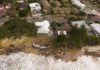 CENTRAL COAST, AUSTRALIA - JULY 17: An aerial view of the coastal erosion to local homes in the suburb of Wamberal on July 17, 2020 in Central Coast, Australia. Beachfront homes along the NSW Central Coast are at risk of collapse due to beach erosion after huge swells hit the states beaches on Thursday. (Photo by James D. Morgan/Getty Images)