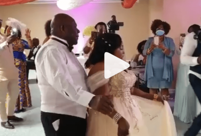 Kyeiwaa dances with her husband at her wedding ceremony