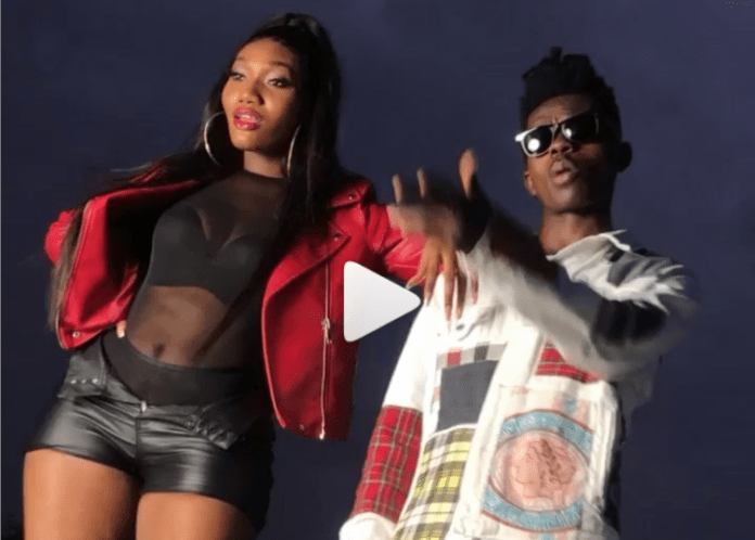L-R: Wendy Shay and Strongman on the set of Mokobe music video shoot