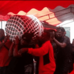 Castro's manager DJ Amess was buried in a microphone-carved coffin