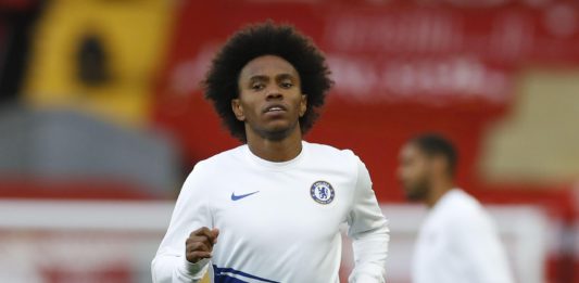 Willian of Chelsea warms up prior to during the Premier League match between Liverpool FC and Chelsea FC at Anfield on July 22, 2020 in Liverpool, England. Image credit: Getty Images