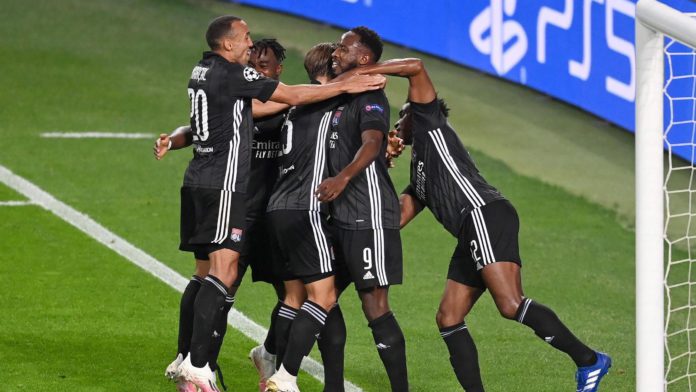 Olympique Lyon players celebrate following their team's victory in the UEFA Champions League Quarter Final match between Manchester City and Lyon at Estadio Jose Alvalade on August 15, 2020 in Lisbon, Portugal Image credit: Getty Images