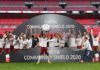 Arsenal's Gabonese striker Pierre-Emerick Aubameyang lifts the trophy after winning the English FA Community Shield football match between Arsenal and Liverpool at Wembley Stadium in north London on August 29, 2020. - Arsenal won the match 5-4 in a penalty shootout after drawing 1-1 in normal time. (Photo by JUSTIN TALLIS / POOL / AFP) / NOT FOR MARKETING OR ADVERTISING USE / RESTRICTED TO EDITORIAL USE