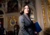 Sen. Kamala Harris walks through the Senate Reception Room to the Senate chamber for the start of the Senate impeachment trial proceedings on Jan. 27, 2020. Bill Clark—CQ-Roll Call/Getty Images
