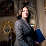 Sen. Kamala Harris walks through the Senate Reception Room to the Senate chamber for the start of the Senate impeachment trial proceedings on Jan. 27, 2020. Bill Clark—CQ-Roll Call/Getty Images
