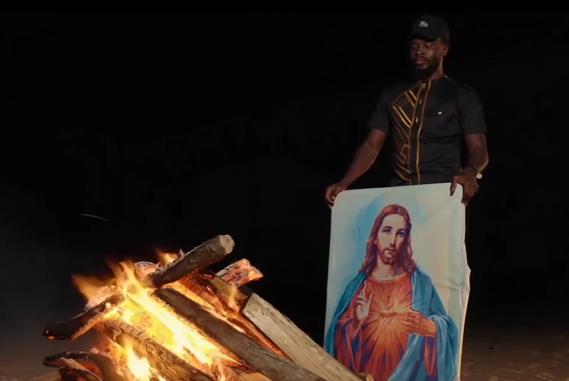 Fuse ODG burns a portrait of Jesus Christ to wake Africans up