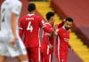 MOHAMED SALAH OF LIVERPOOL CELEBRATES WITH ROBERTO FIRMINO AFTER SCORING HIS TEAM'S THIRD GOAL DURING THE PREMIER LEAGUE MATCH BETWEEN LIVERPOOL AND LEEDS UNITED AT ANFIELD ON SEPTEMBER 12, 2020 IN LIVERPOOL, ENGLAND IMAGE CREDIT: GETTY IMAGES