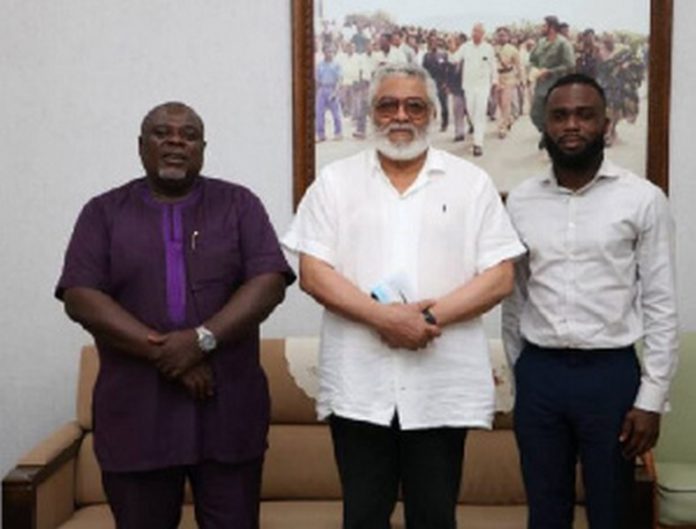 Former President Jerry John Rawlings with son of late John Evans Atta-Mills
