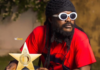 Ras Kuuku poses with his VGMA plaque
