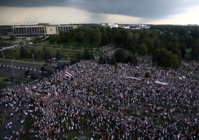 FILE PHOTO: Opposition supporters take part in a rally against presidential election results near the Independence Palace in Minsk, Belarus August 30, 2020. Tut.By via REUTERS