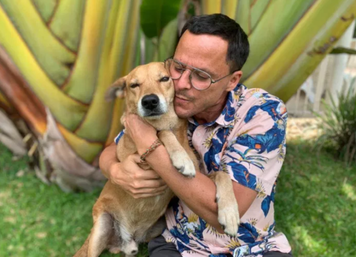 Gregory Andrews and his dog, Kofi