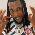Burna Boy wears new Manchester United football jersey