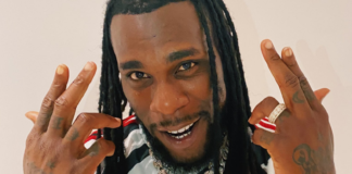 Burna Boy wears new Manchester United football jersey