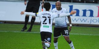 Andre Ayew celebrates with Swansea City teammate