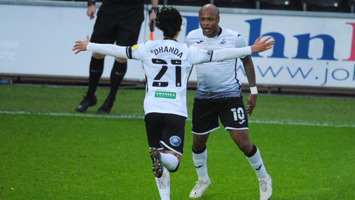 Andre Ayew celebrates with Swansea City teammate