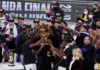 The Los Angeles Lakers players celebrate after the Lakers defeated the Miami Heat 106-93 in Game 6 of basketball's NBA Finals Sunday, Oct. 11, 2020, in Lake Buena Vista, Fla. (AP Photo/John Raoux)