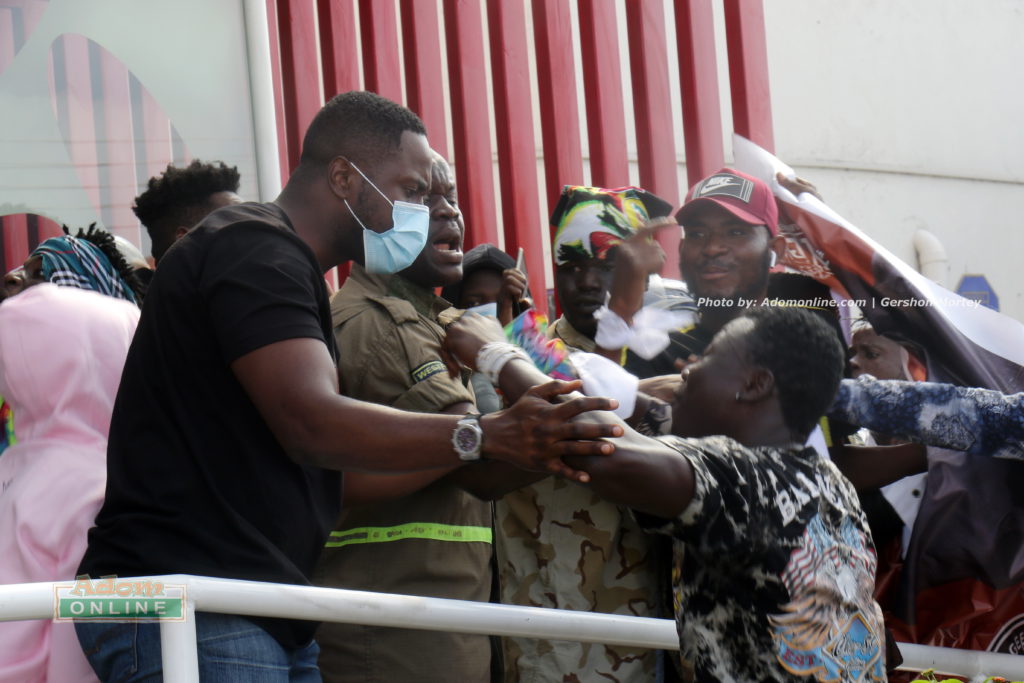 Fans trying to breach security in an attempt to catch a glimpse of Flyboy Geesus