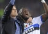 Muntari celebrates with Jose Mourinho