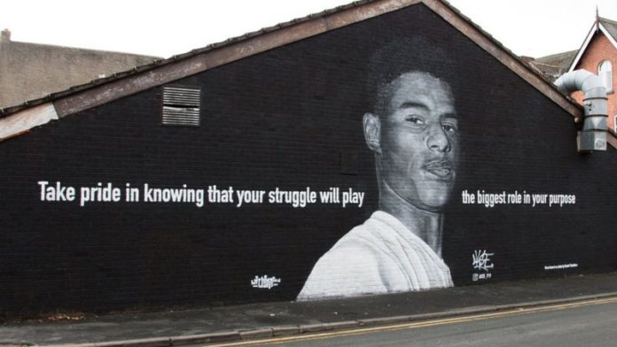 BASED ON PHOTO BY DANIEL CHEETHAM image caption Street artist Akse says Marcus Rashford has 