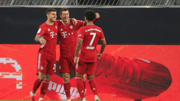 ROBERT LEWANDOWSKI (C) OF MUENCHEN CELEBRATES HIS TEAM'S SECOND GOAL IMAGE CREDIT: GETTY IMAGES