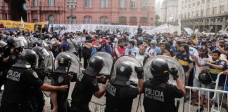 Police clash with fans of Diego Maradona © Getty Images