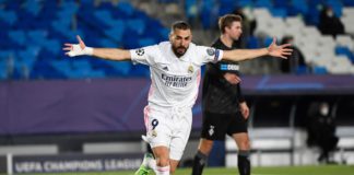 Real Madrid's French forward Karim Benzema celebrates after scoring during the UEFA Champions League group B football match between Real Madrid and Borussia Moenchengladbach at the Alfredo Di Stefano stadium in Valdebebas, northeast of Madrid, on December Image credit: Getty Images