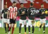 Marcus Rashford of Manchester United celebrates with team mate Alex Telles after scoring their sides first goal during the Premier League match between Sheffield United and Manchester United at Bramall Lane Image credit: Getty Images