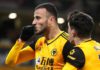 Romain Saiss of Wolverhampton Wanderers celebrates with teammate Pedro Neto after scoring their team's first goal during the Premier League match between Wolverhampton Wanderers and Tottenham Hotspur Image credit: Getty Images