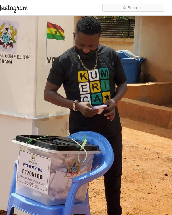 Gospel musician Brother Sammy dons his Kumerica shirt to vote at Bride of Christ Church, Asubonteng