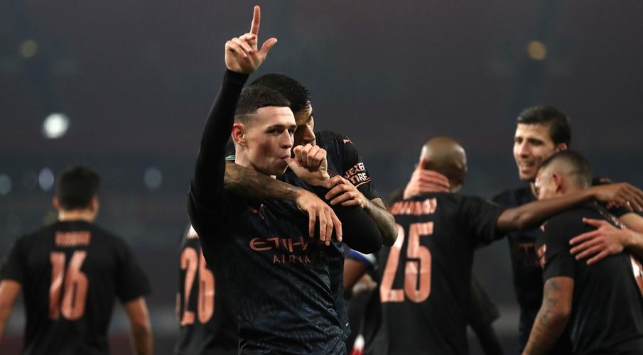 Phil Phoden and Joao Cancelo celebrate © Getty Images