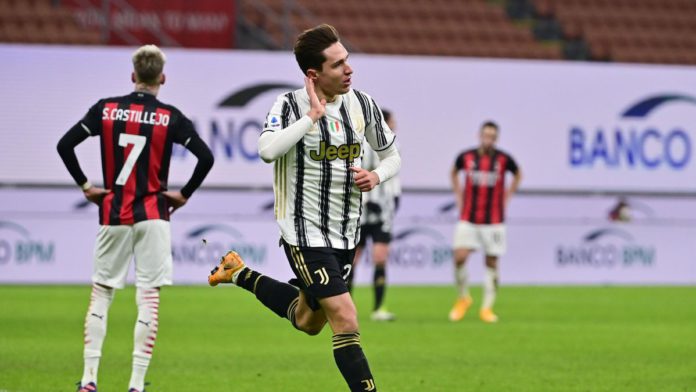 Juventus' Italian forward Federico Chiesa (C) celebrates after scoring his second goal during the Italian Serie A football match AC Milan vs Juventus on January 6, 2021 at the San Siro stadium in Milan. Image credit: Getty Images