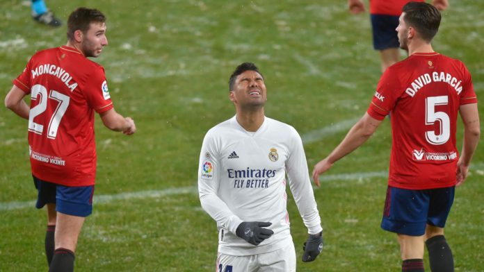 Real Madrid's Brazilian midfielder Casemiro (C) reacts after missing a goal opportunity during the Spanish League football match between Osasuna and Real Madrid at the El Sadar stadium in Pamplona on January 9, 2021. Image credit: Getty Images