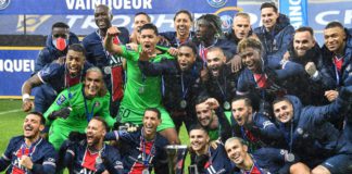 Paris Saint-Germain's players celebrates with the trophy after winning the French Champions Trophy (Trophee des Champions) football match between Paris Saint-Germain (PSG) and Marseille (OM) at the Bollaert-Delelis Stadium Image credit: Getty Images